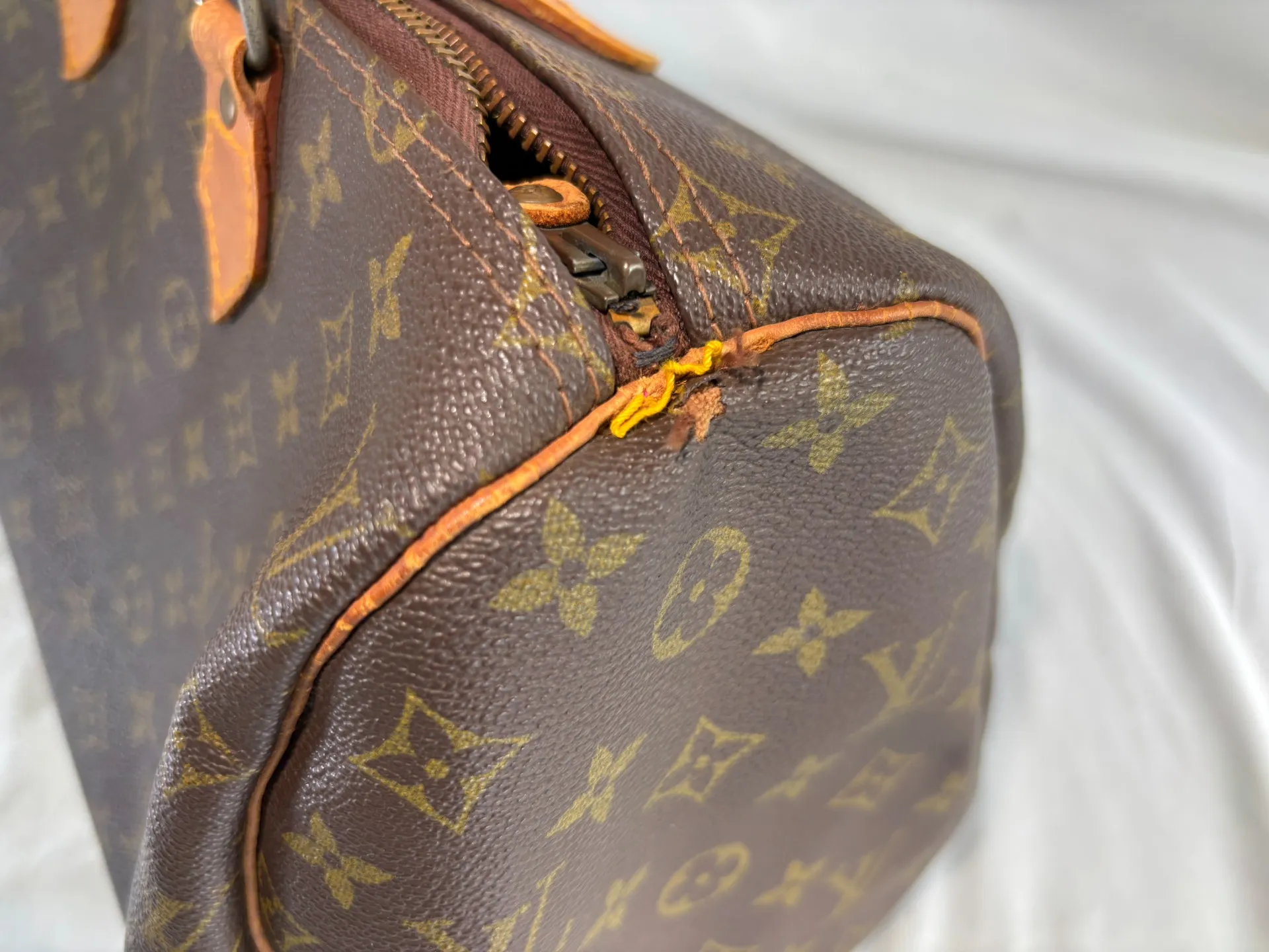 ヴィトンヌメ革交換修理前